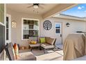 Relaxing patio area with seating and grill at 1400 Summerwood Ct, Spring Hill, FL 34606