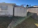 Small storage shed located in the backyard at 3249 Trask Dr, Holiday, FL 34691
