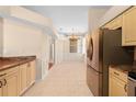 Kitchen with stainless steel appliances and granite countertops at 4201 Silver Berry Ct, Spring Hill, FL 34609