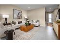 Bright and airy living room with neutral decor and ample natural light at 12582 Amber Creek Cir, Lakewood Ranch, FL 34211