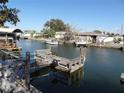 Residential canals with several boats and houses visible at 13730 Gene Rossi Ave, Hudson, FL 34667