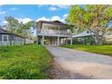 Elevated home with a spacious deck and large backyard at 1244 31St E Ave, Bradenton, FL 34208