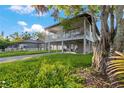 Elevated home with a spacious deck and large backyard at 1244 31St E Ave, Bradenton, FL 34208