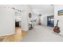 Spacious living room with view of kitchen and sliding doors at 8190 Sturbridge Ct, Weeki Wachee, FL 34613