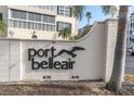 Community entrance sign for Port Bellaire at 155 Bluff View Dr # 103, Belleair Bluffs, FL 33770