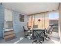 Screened porch with patio furniture, perfect for relaxing at 3844 Kim Dr, Wesley Chapel, FL 33543