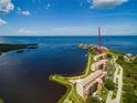 Aerial view of waterfront condo building with access to the bay at 4550 Bay Blvd # 1237, Port Richey, FL 34668