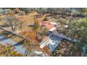 House with a long driveway and large backyard at 5085 Bone Ln, Brooksville, FL 34604