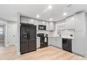 Modern kitchen featuring new appliances and cabinetry at 9240 Whitman Ln, Port Richey, FL 34668