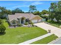 Single-Gathering home with a large backyard and neighborhood view at 18240 Autumn Lake Blvd, Hudson, FL 34667