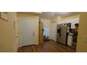 Kitchen with stainless steel appliances and wood flooring at 5031 6Th N Ave, St Petersburg, FL 33710