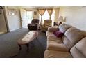 Living room with comfy sofas and coffee table at 6825 Lingo Ct, New Port Richey, FL 34653