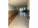 Under construction living room with new flooring at 4829 Onyx Ln # 102, New Port Richey, FL 34652