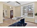 Bright office space featuring a large window and neutral decor at 9617 Norchester Cir, Tampa, FL 33647