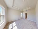 Cozy bedroom with plush carpeting, recessed lighting, and neutral color palette at 10123 Zennia Ln, Parrish, FL 34219