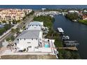 Stunning aerial view showcases the home's location near the water and community at 1421 Apollo Beach Blvd, Apollo Beach, FL 33572