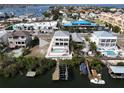 Breathtaking aerial view of the property with waterfront access and private boat dock at 1421 Apollo Beach Blvd, Apollo Beach, FL 33572