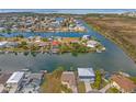 Beautiful aerial view of waterfront homes situated on canals, offering serene water views at 3403 Holly Springs Dr, Hernando Beach, FL 34607
