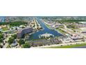 Aerial view of a coastal waterway featuring waterfront homes and condos at 5015 Us Highway 19 # 303, New Port Richey, FL 34652