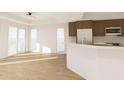 Spacious living area boasting hardwood floors, natural light, and a kitchen with modern appliances at 5015 Us Highway 19 # 608, New Port Richey, FL 34652
