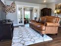 Comfortable living room with plush rug, sliding doors, and elegant decor offering a relaxing atmosphere at 5830 34Th N Ave, St Petersburg, FL 33710