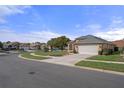Charming single-story home on a cul-de-sac with well-maintained landscaping and a two-car garage at 150 Center Oak Cir, Spring Hill, FL 34609