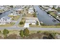 Charming single-story home on a waterfront lot with an expansive driveway in a desirable community at 3449 Companero Entra, Hernando Beach, FL 34607