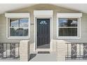 Inviting front entry with a well-maintained facade and updated details at 3551 Harvard Dr, Holiday, FL 34691