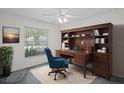 Cozy office featuring built-in shelving and a comfortable workspace with natural light at 7292 Sherman Hills Blvd, Brooksville, FL 34602