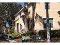 Charming townhome exterior with well-maintained landscaping, showcasing a welcoming community environment at 10936 Keys Gate Dr, Riverview, FL 33579