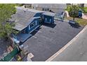 An aerial view of this lovely home with a large driveway and parking space at 291 115Th Ave, Treasure Island, FL 33706