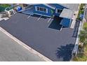 An aerial shot of this well-maintained home and its expansive driveway with parking spaces at 291 115Th Ave, Treasure Island, FL 33706