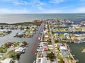 Aerial view of waterfront neighborhood showing canals and beautiful waterfront homes at 3328 Gulfview Dr, Hernando Beach, FL 34607