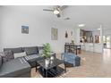 Cozy living room with modern furnishings, neutral tones, and open floor plan at 6027 Bayside Key Dr, Tampa, FL 33615