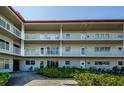 This condo has a lovely exterior with balconies, a manicured lawn, and well-maintained landscaping at 2261 Swedish Dr # 33&35, Clearwater, FL 33763