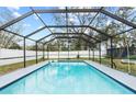 Relaxing screened in pool with a fenced yard, perfect for outdoor entertaining at 2719 40Th W Ave, Bradenton, FL 34205