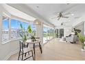 Inviting living area with water views, modern furniture, and an abundance of natural light at 5000 Galleon Ct, New Port Richey, FL 34652