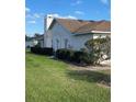 Image of a spacious backyard with a well-maintained lawn and privacy landscaping at 5402 Boxtree Ct, Ridge Manor, FL 33523