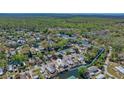 Aerial view of Weeki Wachee River and the houses along it at 6448 W Richard Dr, Weeki Wachee, FL 34607