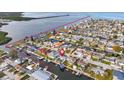 Waterfront community showcases a desirable neighborhood with access to canals and open water, perfect for boating at 13604 Maria Dr, Hudson, FL 34667