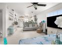 Open floor plan featuring white interiors and a living room that flows seamlessly into the kitchen at 3251 Shoal Line Blvd, Hernando Beach, FL 34607