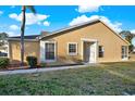 Charming single-story home featuring a well-maintained lawn and a bright, welcoming entrance at 4208 Boston Cir, New Port Richey, FL 34653