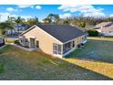 This home boasts a spacious yard and screened in porch at 4208 Boston Cir, New Port Richey, FL 34653