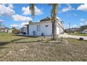 Home showcasing an attached garage, decorative accents, and a welcoming driveway at 4560 Lamson Ave, Spring Hill, FL 34608