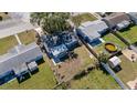 Aerial of the property showing surrounding yard and neighborhood featuring a fenced backyard at 10841 Scenic Dr, Port Richey, FL 34668