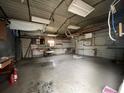 Interior of a large, unfinished metal shed with concrete floor, exposed ceiling, and bare walls at 6361 Boxwood St, Brooksville, FL 34602