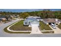 Aerial view of a well-maintained single Gathering home nestled in a quiet neighborhood at 10114 Briar Cir, Hudson, FL 34667