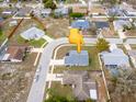 Bird's eye view of a neighborhood with neatly arranged houses and cul-de-sac street at 10114 Briar Cir, Hudson, FL 34667