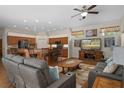 Open concept living room showcasing a seamless blend of relaxation and culinary space at 19263 Quiet Oak Ln, Brooksville, FL 34604