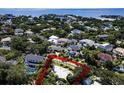An aerial view of a neighborhood with lush landscaping showing location of the home and surrounding properties at 2606 S Hawthorne Cir, Tampa, FL 33629